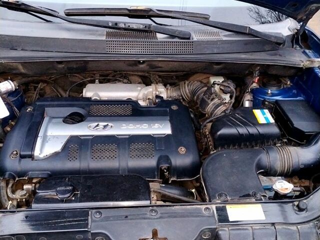 Синий Хендай Туксон, объемом двигателя 2 л и пробегом 219 тыс. км за 8400 $, фото 11 на Automoto.ua