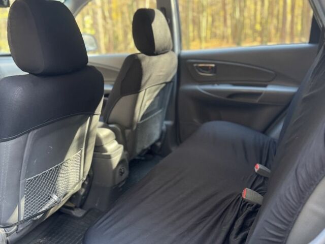 Синій Хендай Туксон, об'ємом двигуна 2 л та пробігом 272 тис. км за 3100 $, фото 7 на Automoto.ua