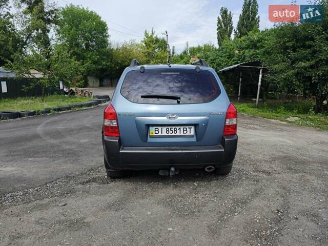 Синій Хендай Туксон, об'ємом двигуна 1.98 л та пробігом 210 тис. км за 6990 $, фото 6 на Automoto.ua