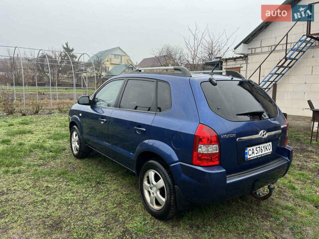 Синій Хендай Туксон, об'ємом двигуна 1.98 л та пробігом 135 тис. км за 7450 $, фото 5 на Automoto.ua