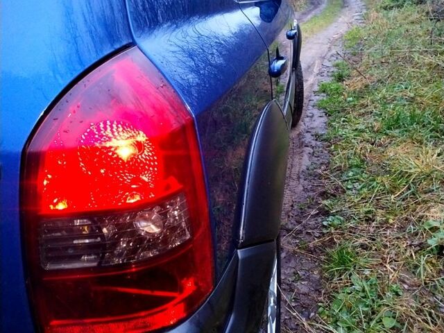 Синий Хендай Туксон, объемом двигателя 2 л и пробегом 219 тыс. км за 8400 $, фото 2 на Automoto.ua