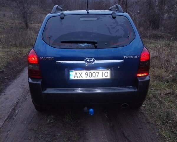 Синій Хендай Туксон, об'ємом двигуна 1.98 л та пробігом 217 тис. км за 8000 $, фото 5 на Automoto.ua