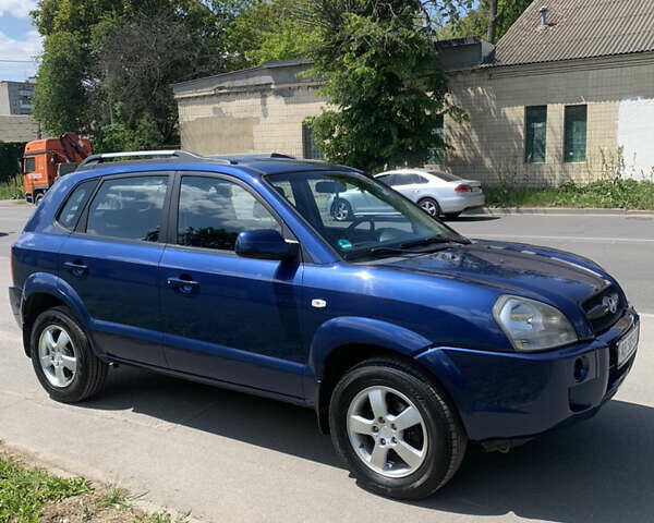 Синий Хендай Туксон, объемом двигателя 1.98 л и пробегом 210 тыс. км за 7300 $, фото 10 на Automoto.ua