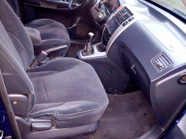 Синий Хендай Туксон, объемом двигателя 2 л и пробегом 219 тыс. км за 8400 $, фото 13 на Automoto.ua