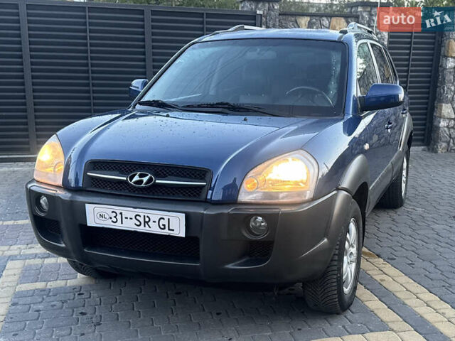 Хендай Туксон 2006 в Хмельницком на Automoto.ua Синий Хендай Туксон, объемом двигателя 2 л и пробегом 218 тыс. км за 7850 $, фото 5 на Automoto.ua