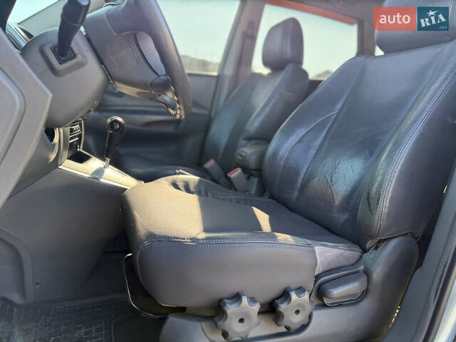 Синій Хендай Туксон, об'ємом двигуна 2 л та пробігом 317 тис. км за 6990 $, фото 10 на Automoto.ua