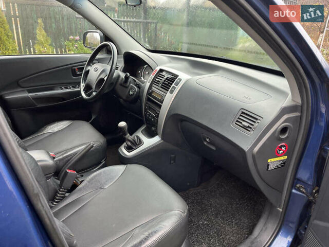 Синій Хендай Туксон, об'ємом двигуна 1.98 л та пробігом 135 тис. км за 7450 $, фото 10 на Automoto.ua