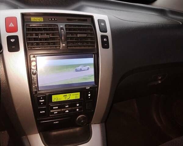 Синій Хендай Туксон, об'ємом двигуна 1.98 л та пробігом 217 тис. км за 8000 $, фото 18 на Automoto.ua