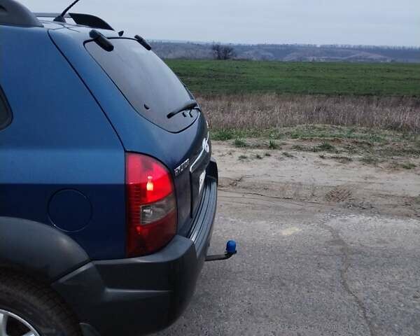 Синій Хендай Туксон, об'ємом двигуна 1.98 л та пробігом 217 тис. км за 8000 $, фото 11 на Automoto.ua