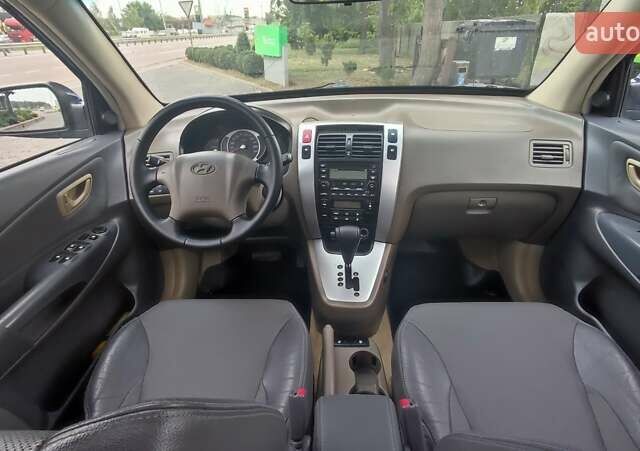 Синій Хендай Туксон, об'ємом двигуна 2 л та пробігом 225 тис. км за 8200 $, фото 12 на Automoto.ua