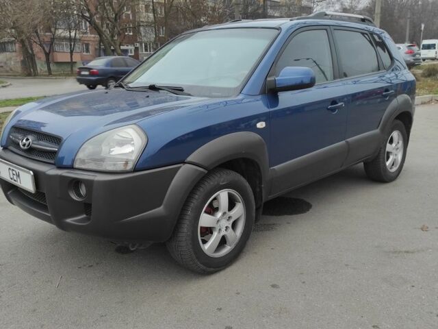 Синий Хендай Туксон, объемом двигателя 2 л и пробегом 225 тыс. км за 7300 $, фото 1 на Automoto.ua