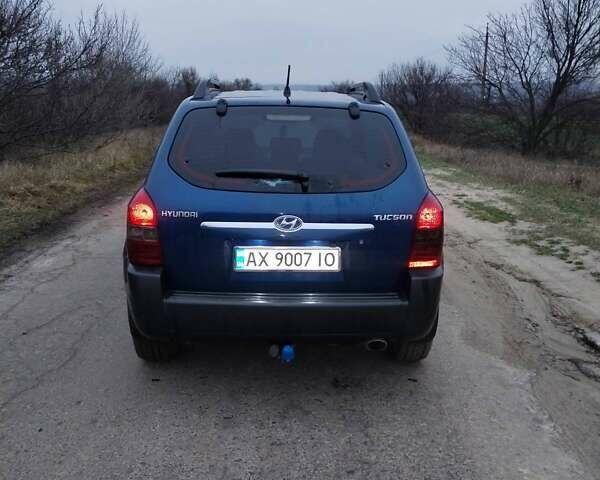 Синій Хендай Туксон, об'ємом двигуна 1.98 л та пробігом 217 тис. км за 8000 $, фото 4 на Automoto.ua