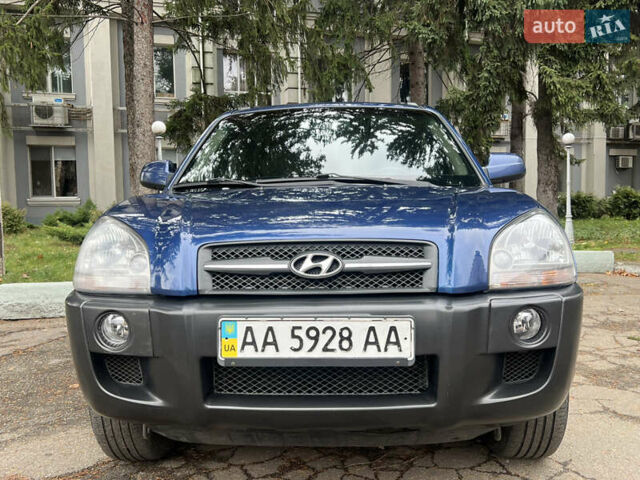 Синий Хендай Туксон, объемом двигателя 2 л и пробегом 190 тыс. км за 7500 $, фото 10 на Automoto.ua