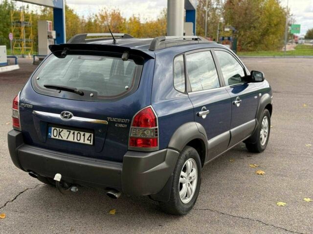 Синий Хендай Туксон, объемом двигателя 2 л и пробегом 262 тыс. км за 4450 $, фото 4 на Automoto.ua