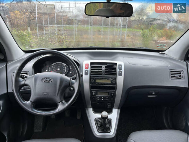 Синій Хендай Туксон, об'ємом двигуна 1.98 л та пробігом 135 тис. км за 7450 $, фото 8 на Automoto.ua