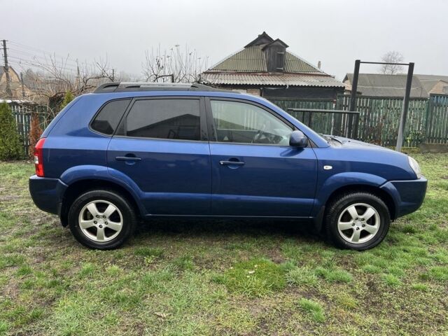 Синий Хендай Туксон, объемом двигателя 2 л и пробегом 135 тыс. км за 7450 $, фото 4 на Automoto.ua