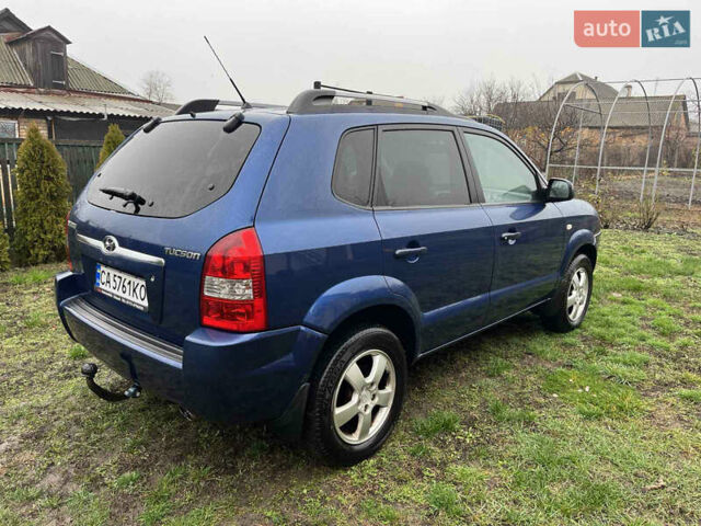 Синій Хендай Туксон, об'ємом двигуна 1.98 л та пробігом 135 тис. км за 7450 $, фото 6 на Automoto.ua