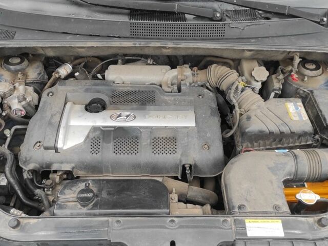 Синий Хендай Туксон, объемом двигателя 2 л и пробегом 225 тыс. км за 7300 $, фото 10 на Automoto.ua