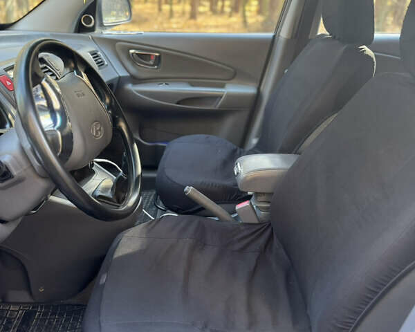 Хендай Туксон 2006 в Житомире на Automoto.ua Синий Хендай Туксон, объемом двигателя 2 л и пробегом 271 тыс. км за 3500 $, фото 4 на Automoto.ua