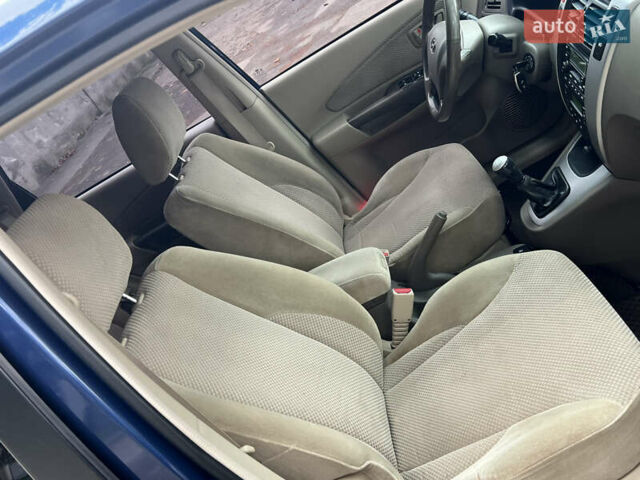 Синий Хендай Туксон, объемом двигателя 2 л и пробегом 190 тыс. км за 7500 $, фото 26 на Automoto.ua