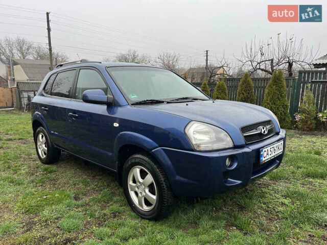 Синій Хендай Туксон, об'ємом двигуна 1.98 л та пробігом 135 тис. км за 7450 $, фото 1 на Automoto.ua