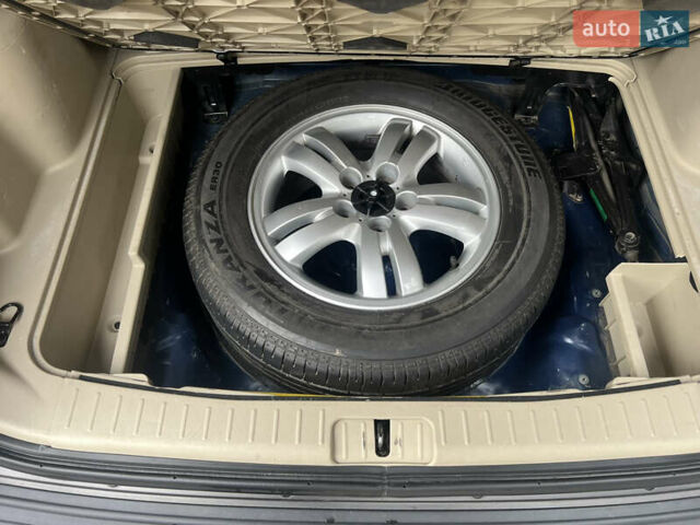 Синий Хендай Туксон, объемом двигателя 2 л и пробегом 190 тыс. км за 7500 $, фото 31 на Automoto.ua