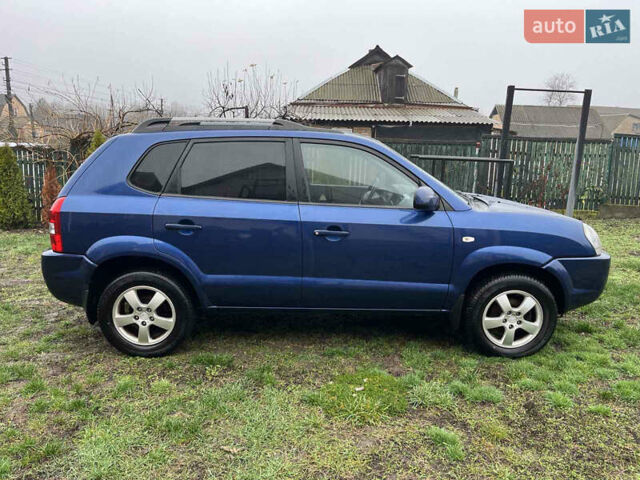 Синій Хендай Туксон, об'ємом двигуна 1.98 л та пробігом 135 тис. км за 7450 $, фото 4 на Automoto.ua