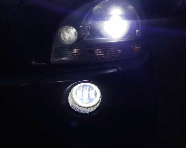 Синій Хендай Туксон, об'ємом двигуна 1.98 л та пробігом 217 тис. км за 8000 $, фото 8 на Automoto.ua