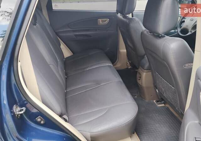 Хендай Туксон 2006 в Житомире на Automoto.ua Синий Хендай Туксон, объемом двигателя 2 л и пробегом 225 тыс. км за 7950 $, фото 13 на Automoto.ua