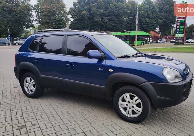 Синій Хендай Туксон, об'ємом двигуна 2 л та пробігом 225 тис. км за 7950 $, фото 2 на Automoto.ua