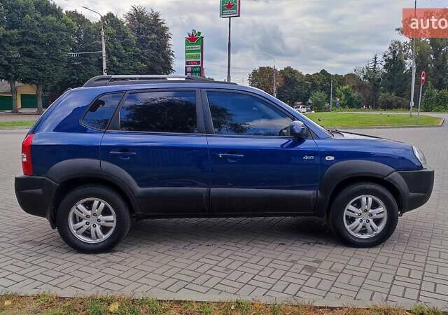 Синій Хендай Туксон, об'ємом двигуна 2 л та пробігом 225 тис. км за 7950 $, фото 3 на Automoto.ua