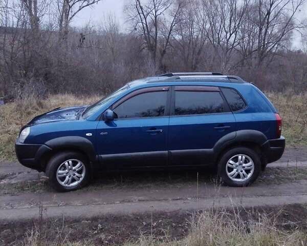 Синій Хендай Туксон, об'ємом двигуна 1.98 л та пробігом 217 тис. км за 8000 $, фото 7 на Automoto.ua