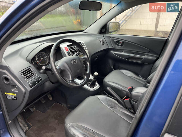 Синій Хендай Туксон, об'ємом двигуна 1.98 л та пробігом 135 тис. км за 7450 $, фото 9 на Automoto.ua