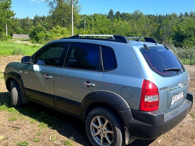 Синий Хендай Туксон, объемом двигателя 2 л и пробегом 280 тыс. км за 7500 $, фото 1 на Automoto.ua