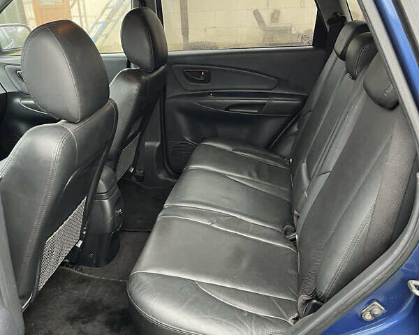 Синій Хендай Туксон, об'ємом двигуна 1.98 л та пробігом 135 тис. км за 7450 $, фото 12 на Automoto.ua