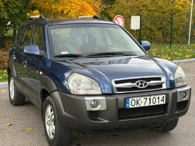 Синий Хендай Туксон, объемом двигателя 2 л и пробегом 262 тыс. км за 4450 $, фото 2 на Automoto.ua