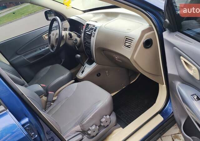 Синій Хендай Туксон, об'ємом двигуна 2 л та пробігом 225 тис. км за 7950 $, фото 10 на Automoto.ua