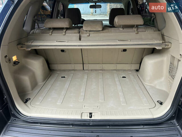 Синий Хендай Туксон, объемом двигателя 2 л и пробегом 190 тыс. км за 7500 $, фото 30 на Automoto.ua