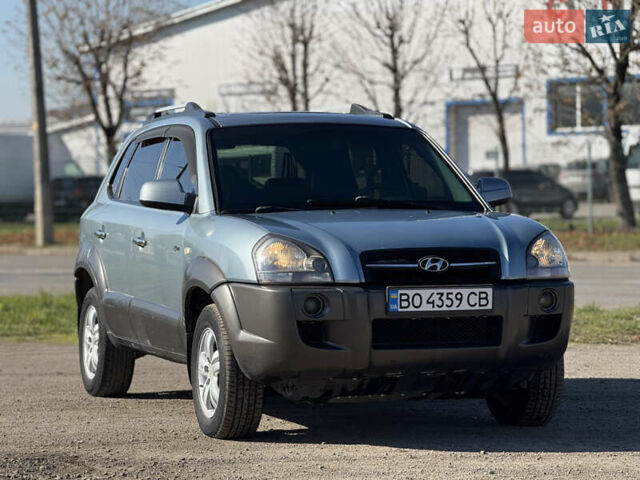 Синій Хендай Туксон, об'ємом двигуна 2 л та пробігом 317 тис. км за 6990 $, фото 2 на Automoto.ua