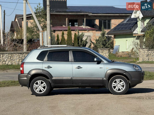 Синій Хендай Туксон, об'ємом двигуна 2 л та пробігом 317 тис. км за 6990 $, фото 3 на Automoto.ua