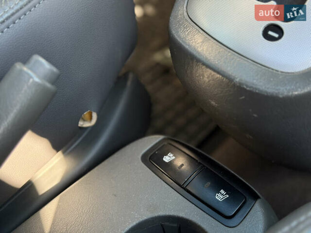 Синій Хендай Туксон, об'ємом двигуна 2 л та пробігом 317 тис. км за 6990 $, фото 9 на Automoto.ua