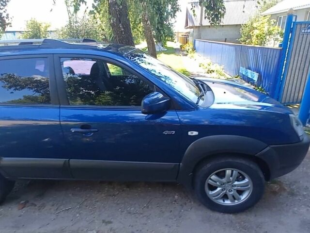 Синий Хендай Туксон, объемом двигателя 2 л и пробегом 156 тыс. км за 8300 $, фото 3 на Automoto.ua