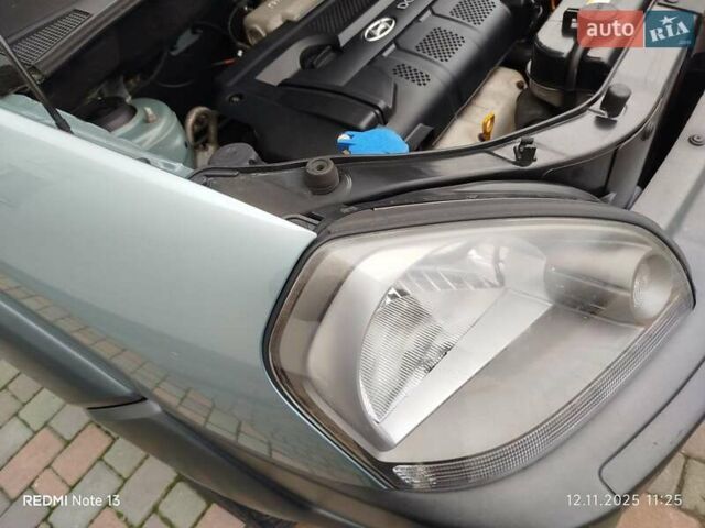 Синий Хендай Туксон, объемом двигателя 2 л и пробегом 213 тыс. км за 8900 $, фото 90 на Automoto.ua