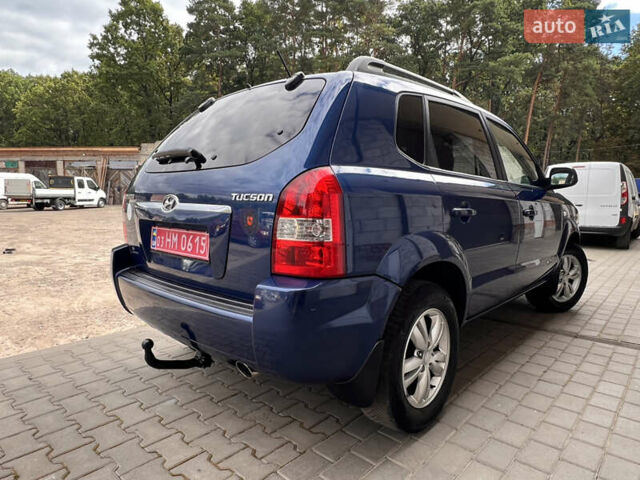 Синий Хендай Туксон, объемом двигателя 2 л и пробегом 218 тыс. км за 6700 $, фото 5 на Automoto.ua
