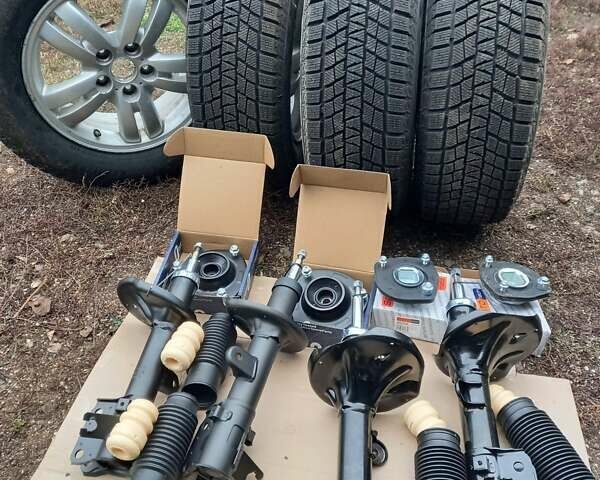 Синий Хендай Туксон, объемом двигателя 2 л и пробегом 170 тыс. км за 8500 $, фото 4 на Automoto.ua