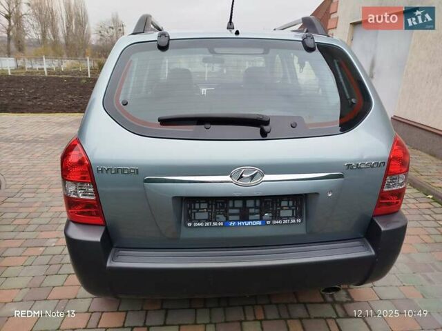 Синий Хендай Туксон, объемом двигателя 2 л и пробегом 213 тыс. км за 8900 $, фото 13 на Automoto.ua
