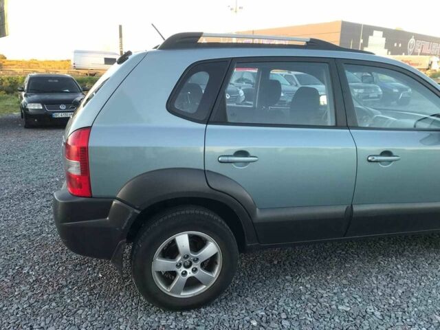 Синий Хендай Туксон, объемом двигателя 2 л и пробегом 207 тыс. км за 6890 $, фото 16 на Automoto.ua