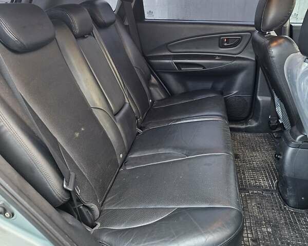 Синій Хендай Туксон, об'ємом двигуна 1.98 л та пробігом 203 тис. км за 8200 $, фото 14 на Automoto.ua