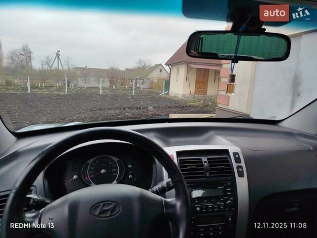 Синий Хендай Туксон, объемом двигателя 2 л и пробегом 213 тыс. км за 8900 $, фото 49 на Automoto.ua