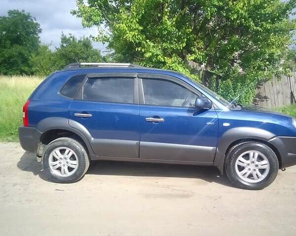 Синій Хендай Туксон, об'ємом двигуна 1.98 л та пробігом 190 тис. км за 7900 $, фото 5 на Automoto.ua